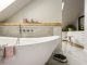 De badkamer en suite